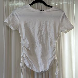 White shirt with tie details